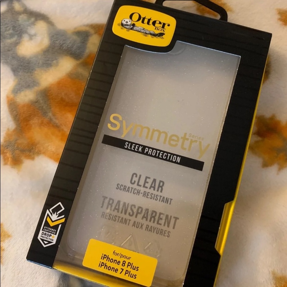 Clear with Sparkles Otterbox phone case.